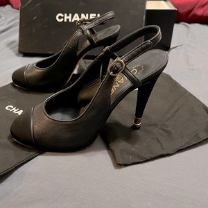 Chanel captor sling back heels with gold heel access.